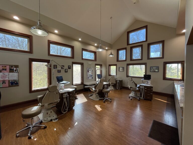 Interior of the Beavercreek office, showing examining chairs with lots of windows and a wooden floor.